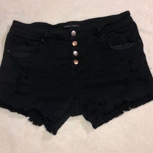 black ripped jean shorts
